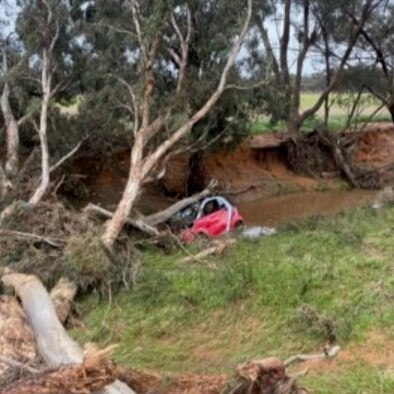 The red Mercedes Benz swept away by Bendigo creek on October 22, 2022. Marlene Wing-Quay managed to escape through a window.