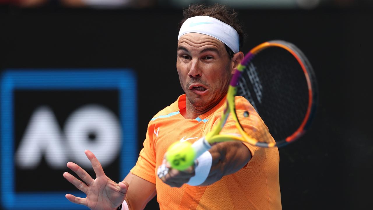 MELBOURNE, AUSTRALIA - JANUARY 16: Rafael Nadal of Spain plays a forehand in their round one singles match against Jack Draper of Great Britain during day one of the 2023 Australian Open at Melbourne Park on January 16, 2023 in Melbourne, Australia. (Photo by Clive Brunskill/Getty Images)