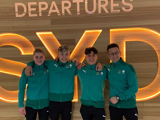 Gymnasts John Carroll, Tru Hagens and Daniel Chalabov, alongside coach Vassili Trofimov, as they leave to compete in the Future Cup in Linz, Austria, in November 2022. Photo: supplied.