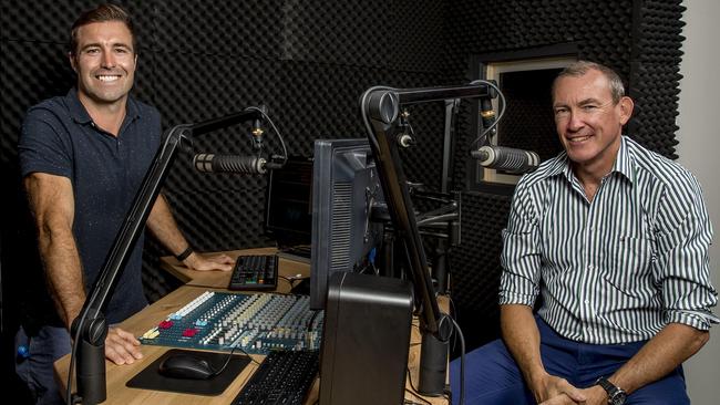 Pacific Pines State High School teacher and former radio personality Michael Walkley runs Radio Pac Pines with help from students, he’s pictured here with principal Mark Peggrem. Picture: Jerad Williams.