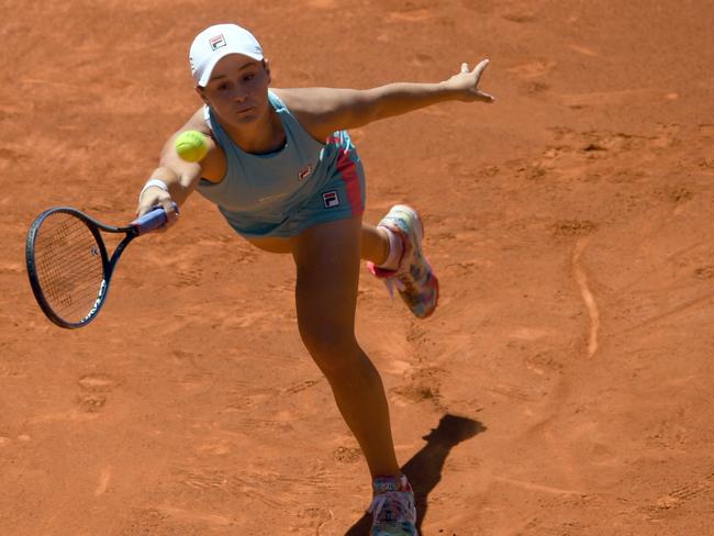 New Zealand's Ashleigh Barty returns the ball to Czechoslovakia's Petra Kvitova during their 2021 WTA Tour Madrid Open tennis tournament singles match at the Caja Magica in Madrid on May 4, 2021. (Photo by OSCAR DEL POZO / AFP)