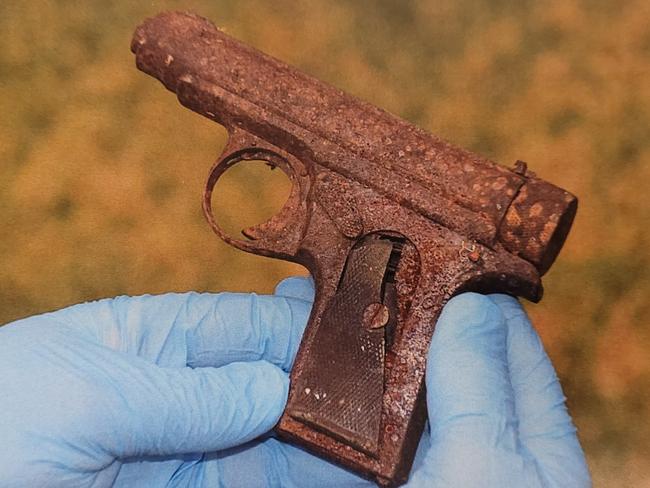 A 100 year old JP Sauer & Sohn self-loading pistol which Alexander Adam Howell threw on a roof after using it to shoot through his former partner's couch.  The rusted weapon was left on a roof for almost 18months before it was found.