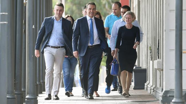 Premier Steven Marshall with new members of his team including Matthew Cowdrey and Paula Luethen at Henley Beach. Picture: AAP / Tracey Nearmy