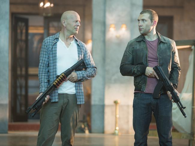 Bruce Willis with Australian actor Jai Courtney in a scene from the movie A Good Day To Die Hard. Picture: Supplied