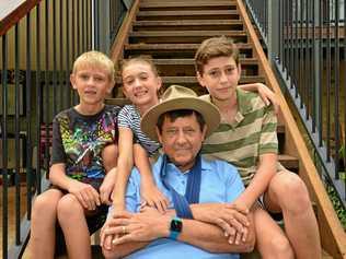 LUCKY TO BE ALIVE: Andrew Carmody and his family Carlo, 13, Ruby, 10 and Roman, 7 back at home in Mudjimba after a head-on crash last week. Picture: John McCutcheon