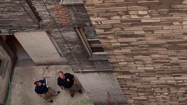 The courtyard of the Bronx apartment where the baby was thrown out the window.