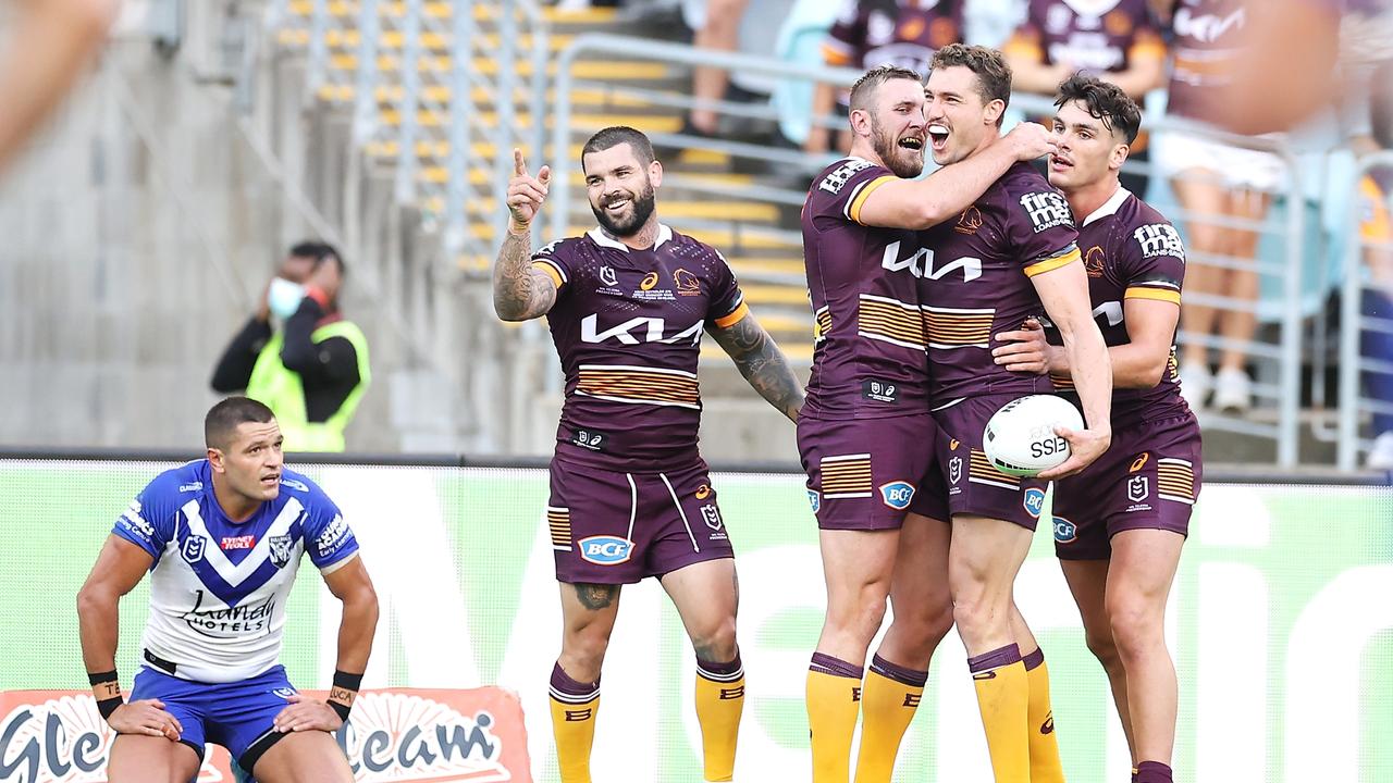 Corey Oates celebrates his first-half try, with Adam Reynolds (L) never too far away. Picture: Getty