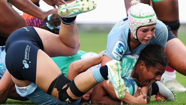 SYDNEY, AUSTRALIA - FEBRUARY 28: Josifini Neihamu of Drua scores a try during the round one Super Rugby Women's match between NSW Waratahs and Fijian Drua at Allianz Stadium on February 28, 2025 in Sydney, Australia. (Photo by Cameron Spencer/Getty Images)