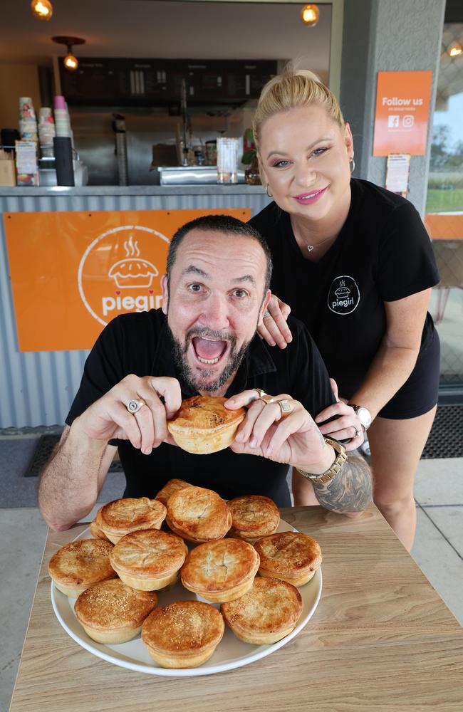 Pie Girl Helensvale will be holding their first ever pie eating competition on October 26. Owner Amy Grotegoed gets her husband Danny Grotegoed into training. Picture: Glenn Hampson