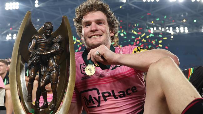 SYDNEY, AUSTRALIA - OCTOBER 06:  Liam Martin of the Panthers poses with the Provan-Summons Trophy after winning the 2024 NRL Grand Final match between the Melbourne Storm and the Penrith Panthers at Accor Stadium on October 06, 2024, in Sydney, Australia. (Photo by Cameron Spencer/Getty Images)