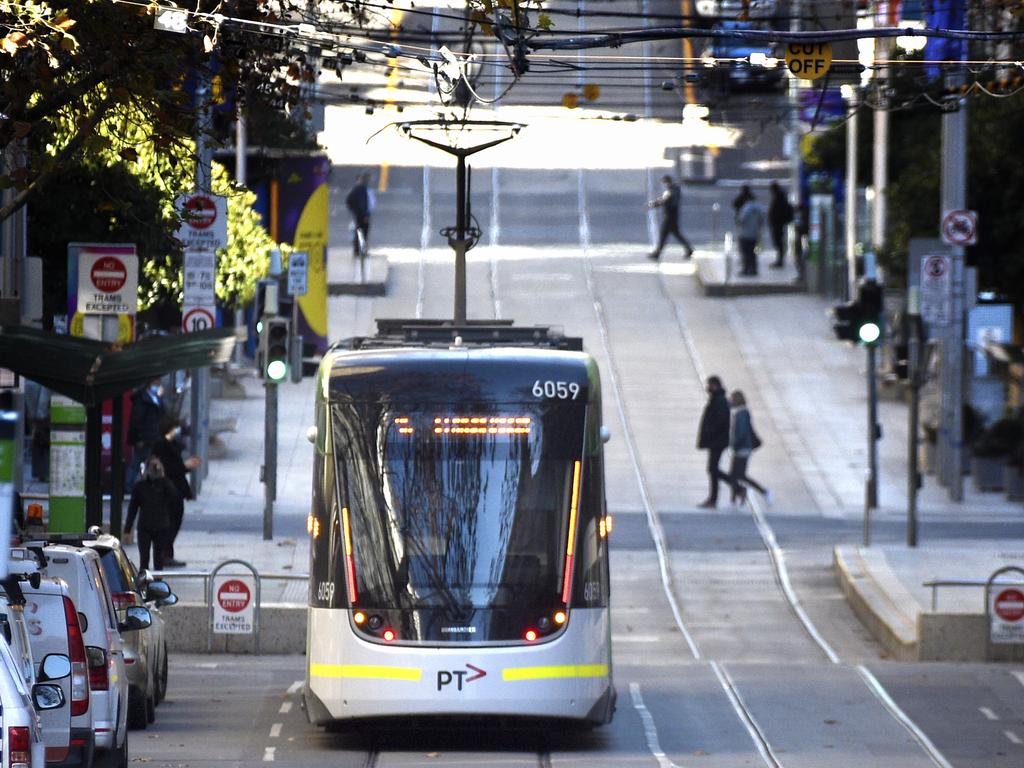 Bourke Street in central Melbourne is almost deserted as a further week of lockdown is announced.