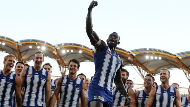 Daw celebrates his first game back with the Roos at Metricon Stadium. Picture: Michael Klein