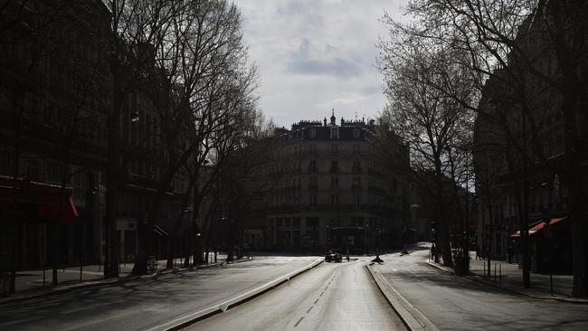 An empty street near the Republique square is seen in Paris overnight (AEDT). Picture: AP