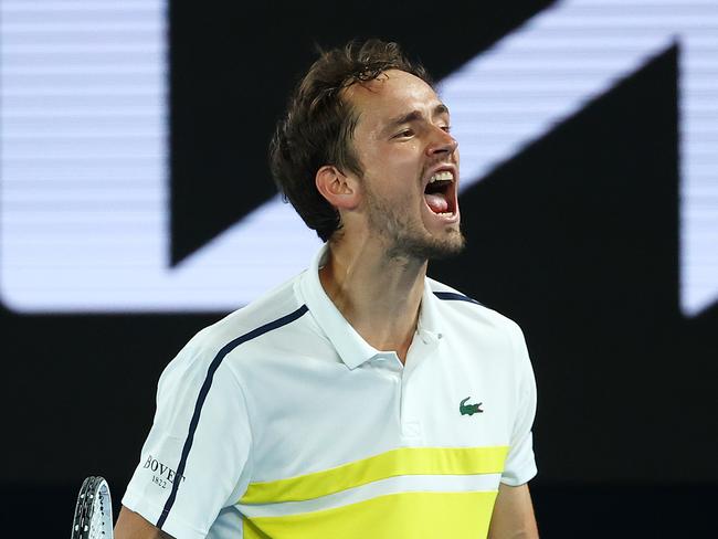 MELBOURNE, AUSTRALIA - FEBRUARY 19: Daniil Medvedev of Russia celebrates after winning a game in his Men's Singles Semifinals match against Stefanos Tsitsipas of Greece during day 12 of the 2021 Australian Open at Melbourne Park on February 19, 2021 in Melbourne, Australia. (Photo by Cameron Spencer/Getty Images)