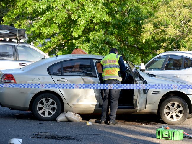 Police investigate after the Kooyong rave crash. Picture: Andrew Henshaw