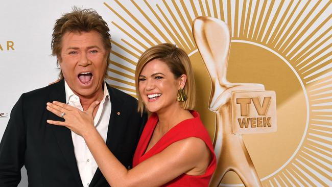 Richard Wilkins and Sarah Harris stepped up as MCs. (AAP Image/Darren England)