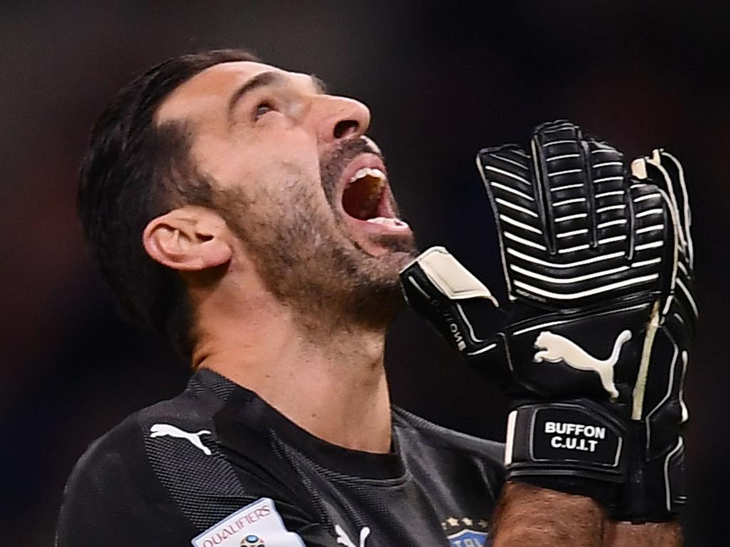 ALTERNATIVE CROP - Italy's goalkeeper Gianluigi Buffon reacts during the FIFA World Cup 2018 qualification football match between Italy and Sweden, on November 13, 2017 at the San Siro stadium in Milan. / AFP PHOTO / Marco BERTORELLO