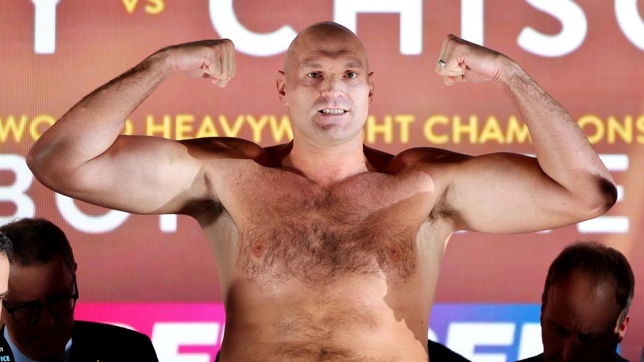 Tyson Fury weighs in. (Photo by Andrew Redington/Getty Images)