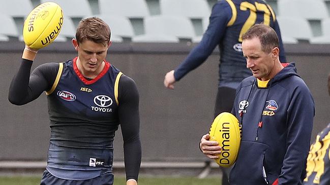 Matt Crouch talks to his coach Don Pyke at Crows training. Picture SARAH REED