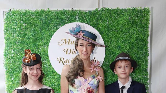 Lisa, Isla and Mitchell attend the Mansfield Cup races. Picture: Brendan Beckett