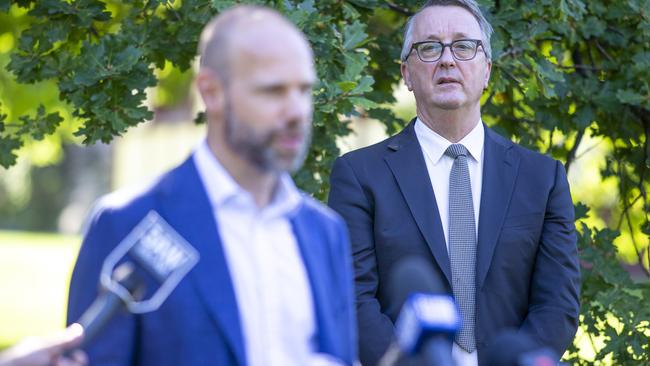 Victoria Health Minister Martin Foley looks on while Testing commander Jeroen Weimar talks to the media. Picture: Wayne Taylor/Getty Images.