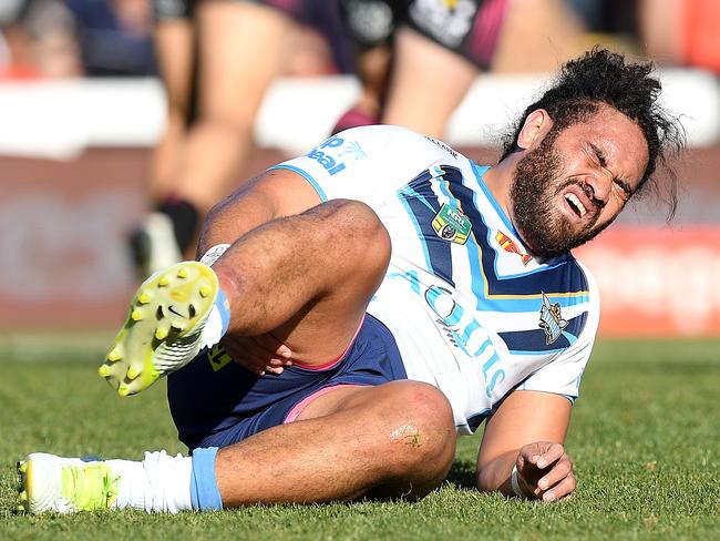 Konrad Hurrell goes down injured against the Panthers in round 20.