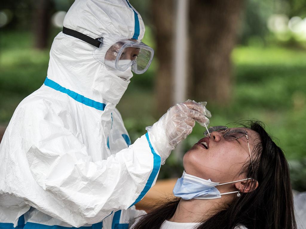 Coronavirus testing in Wuhan. Picture: STR/AFP