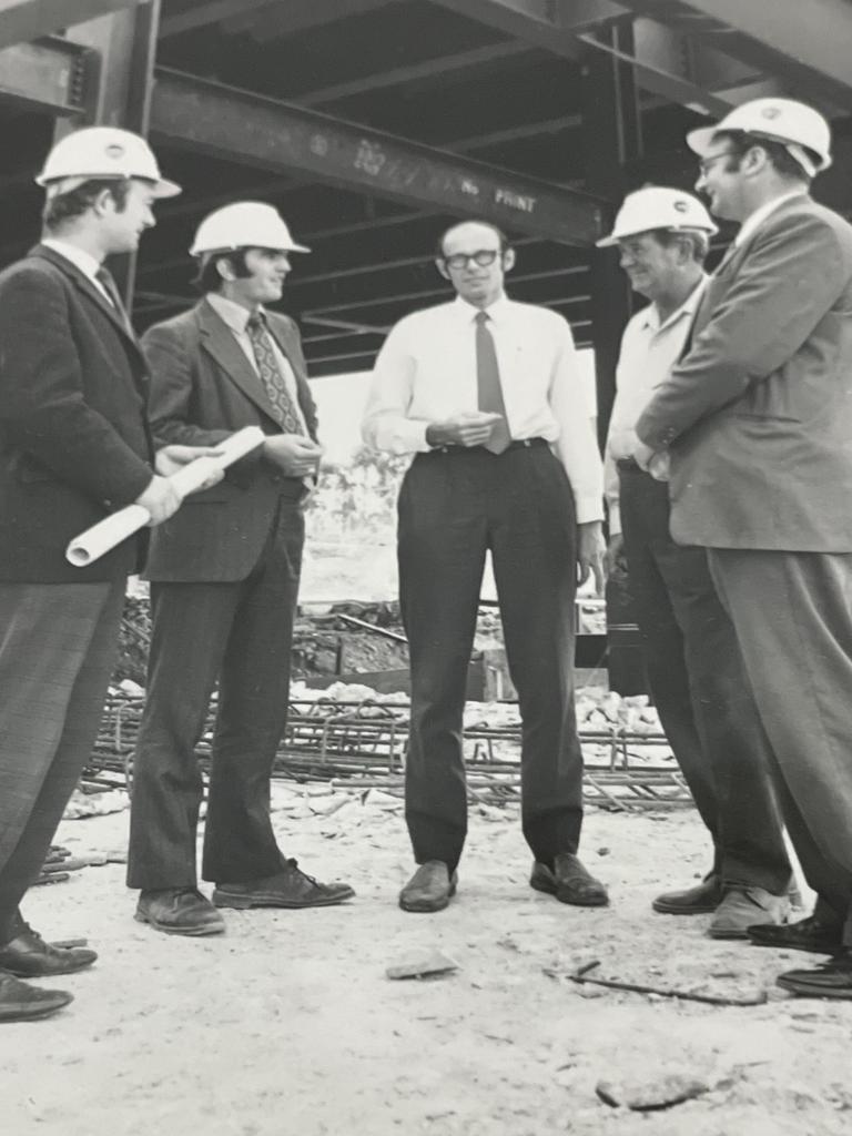 A site meeting was held on September 9, 1971. Ron Allars (Winterbottom Moore and Associates), Jim Kendal (Longworth and McKenzie), Colin Christophers (TCCEC), Bob Jeffries (Kell and Rigby) and George Smith (Sydney Steel) discuss plans.