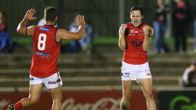 Alex Forster (right) celebrates kicking a goal for Norwood last year. Picture: Stephen Laffer.