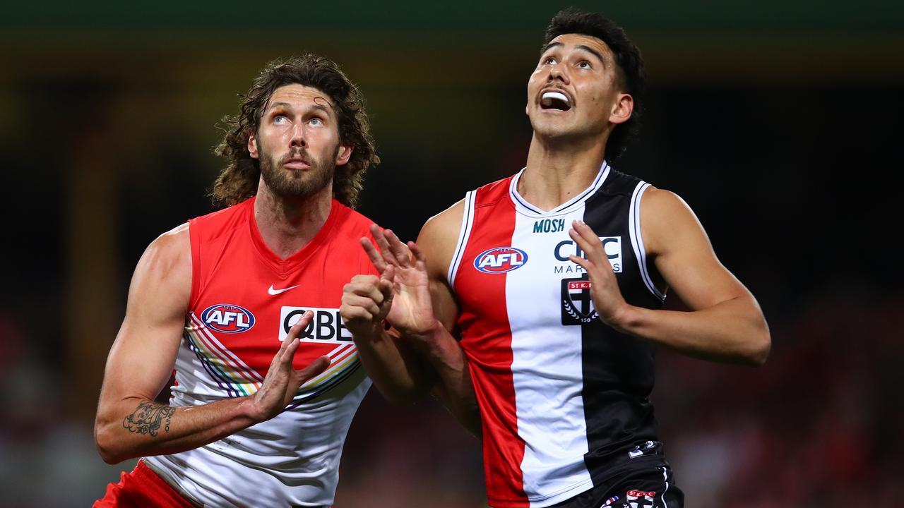 Mitch Owens in the ruck against Tom Hickey.