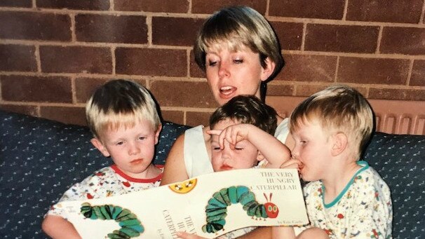 Zachary Rolfe, centre, as a child with his older brothers and mother Deborah.