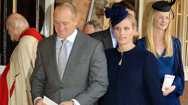 Godparent Zara Philips and husband England rugby player Mike Tindall leave the Chapel Royal in St James's Palace, after the christening of the three month-old Prince George.