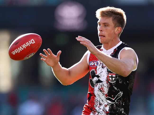 SYDNEY, AUSTRALIA - JUNE 05: Sebastian Ross of the Saints gathers the ball during the round 12 AFL match between the St Kilda Saints and the Sydney Swans at Sydney Cricket Ground on June 05, 2021 in Sydney, Australia. (Photo by Cameron Spencer/Getty Images)