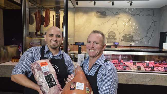 Andrews Meats co-owners Brett Owen (left) and Andrew Wishart show off their goods at their newly opened store in Grand Centrals Market Room. . Picture: Kevin Farmer