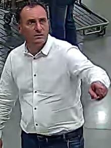 Ciro Gallo seen on CCTV footage after allegedly posing as a marketing director of luxury label Versace and fleecing people across western Sydney.