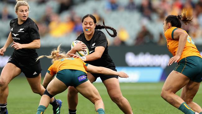 The wallaroos playing the Black Ferns last year.