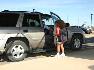 HEALTH FEARS: Are children breathing in dangerous car fumes while waiting outside schools for their parents to pick them up? Picture: Jaimie Duplass