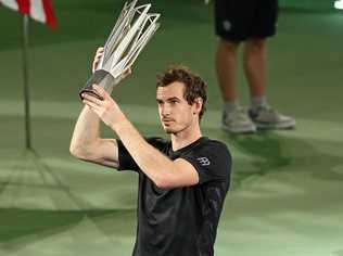 Andy Murray holds up his the Shanghai Masters trophy after defeating Roberto Bautista Agut of Spain. Picture: Chen di