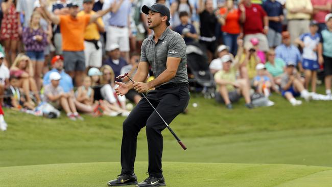 Jason Day of Australia reacts to after missing on his birdie-attempt on the 18th green.
