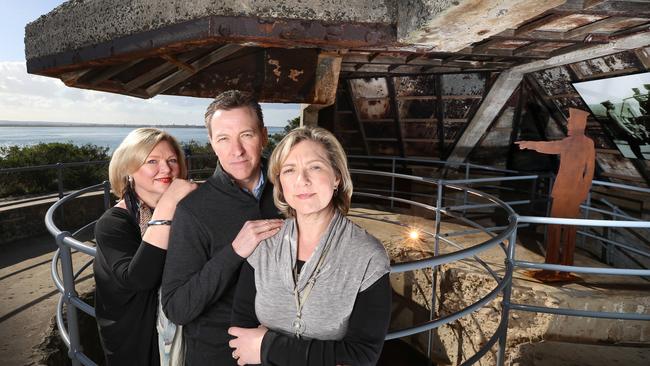 Louise Nicol, John Purdue, and Carolyn Smyth are proud of their grandfather John Purdue, who fired what is considered the first Allied shot of the war at Fort Nepean. Picture: Alex Coppel