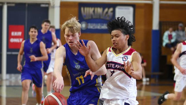 Action from the GPS basketball round 1 match between Brisbane State High and Churchie. Pictured is Churchies Kallen Mattsson and Brisbanes Kian San Jose. Picture: Tertius Pickard