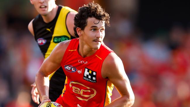 GOLD COAST, AUSTRALIA - MARCH 09: Wil Powell of the Suns in action during the 2024 AFL Opening Round match between the Gold Coast SUNS and the Richmond Tigers at People First Stadium on March 09, 2024 in Gold Coast, Australia. (Photo by Dylan Burns/AFL Photos via Getty Images)