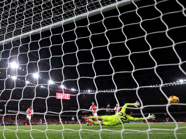 Mohamed Salah scores Liverpool's second goal at the Emirates Stadium. Picture: AFP