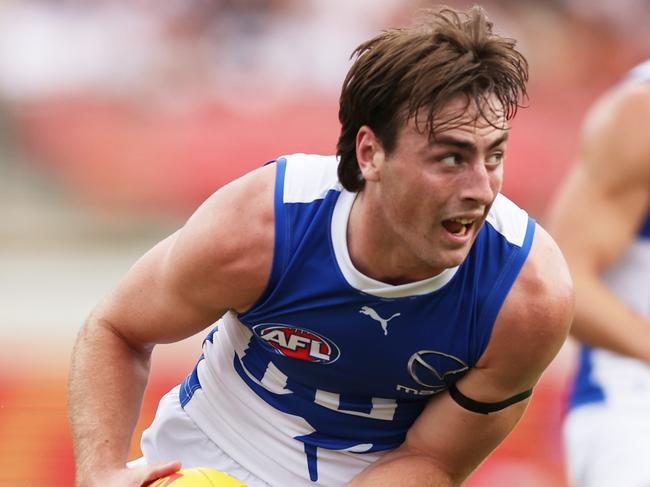 SYDNEY, AUSTRALIA - MARCH 16:  George Wardlaw of the Kangaroos in action during the round one AFL match between Greater Western Sydney Giants and North Melbourne Kangaroos at ENGIE Stadium, on March 16, 2024, in Sydney, Australia. (Photo by Matt King/AFL Photos/via Getty Images )