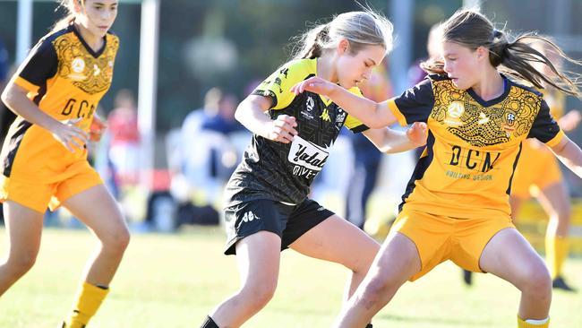 SOCCER: Junior football carnival, Maroochydore. Sunshine Coast Wanderers V Logan Lighting Maroon, junior girls. Picture: Patrick Woods.