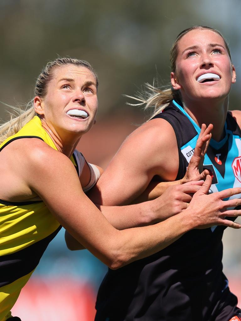 Scholz in a ruck contest against Richmond’s Katie Brennan. Picture: James Elsby/AFL Photos via Getty Images