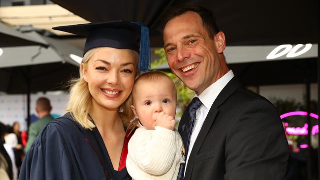 Courtney Thomason and husband Matthew Garrett with their son Grayson at the Deakin University Graduation post ceremony celebration. Picture: Alison Wynd