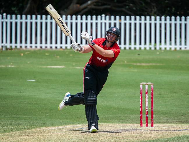 UTS North Sydney’s Tim Reynolds hits one in the air. Picture: Kate Zarifeh