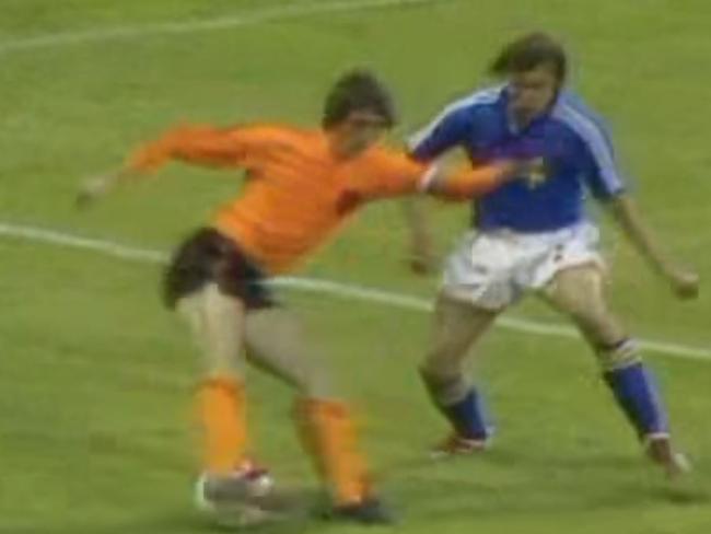 Poetry in motion: Cruyff bamboozles Swedish defender Jan Olsson.