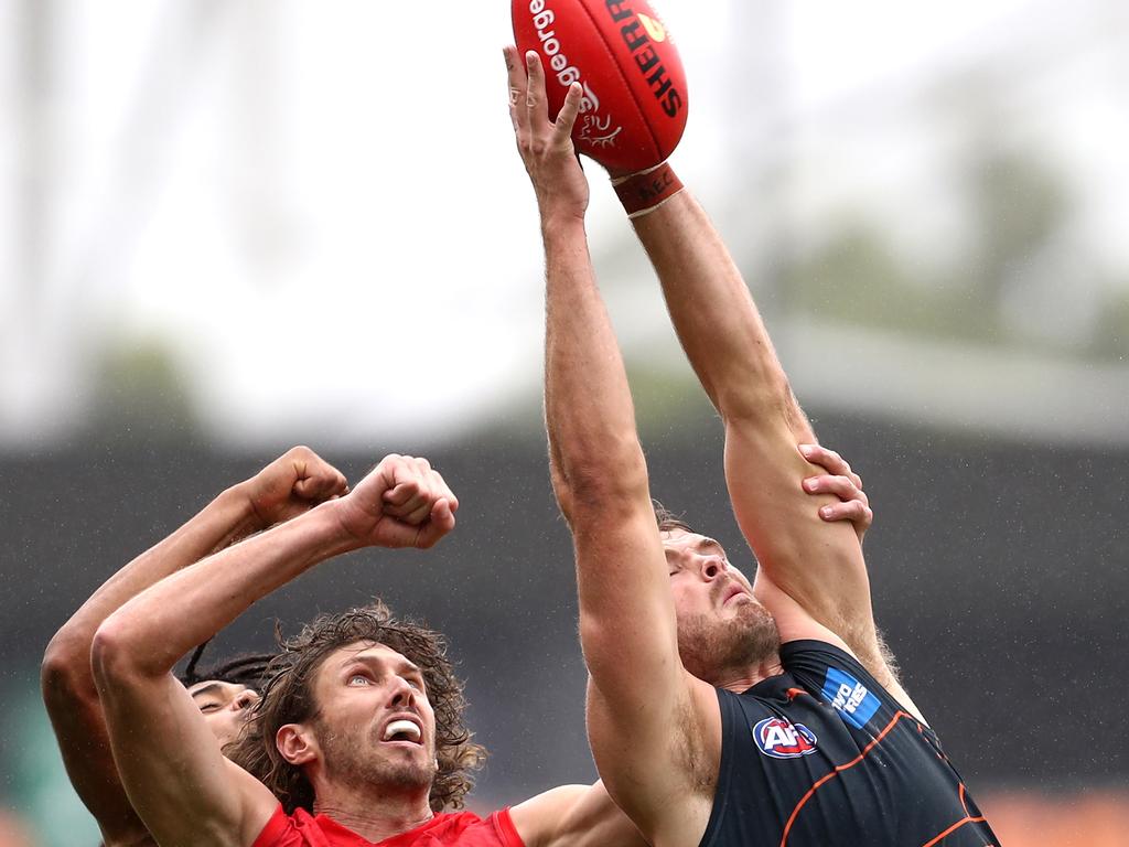 Tall timber Matt Flynn (right) will head up the ruck stocks for the Giants.